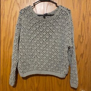 Sweater with holes